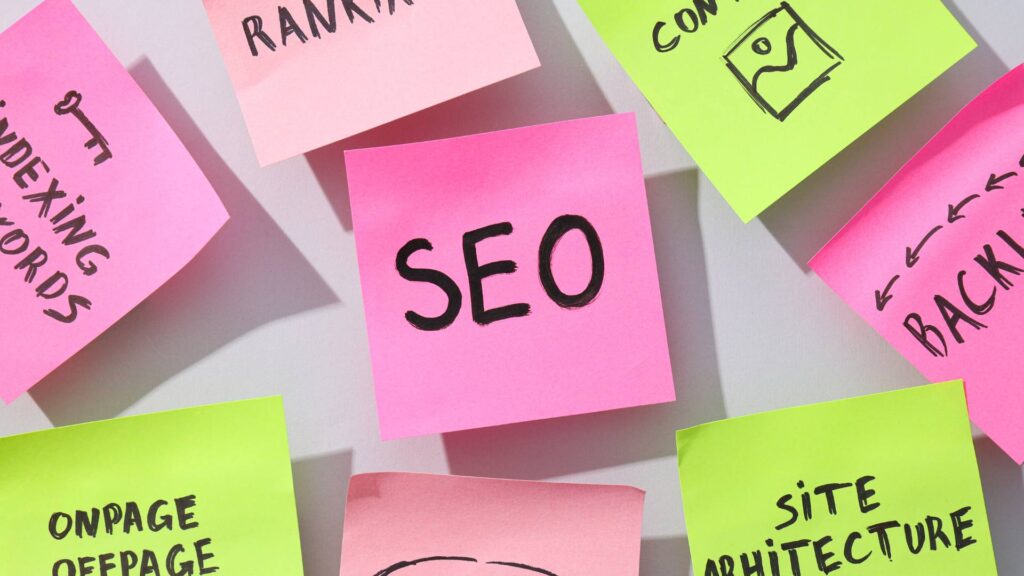 Colorful post it notes are displayed, demonstrating the steps to an seo audit.